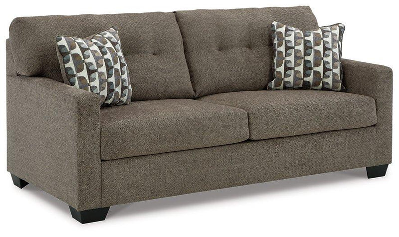 Ashley Furniture Mahoney living room set with sofa, loveseat, and armchair in a modern design, displayed in a cozy living space.