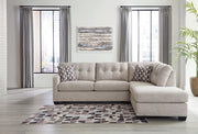 Ashley Furniture Mahoney living room set with a sofa and loveseat, featuring neutral upholstery and modern design.