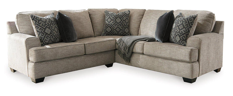 Ashley Furniture Bovarian living room set featuring a sofa, loveseat, and armchair with neutral upholstery and modern design.