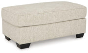 Ashley Furniture Heartcort living room set with plush sofas and coordinating coffee table, modern design in neutral tones.