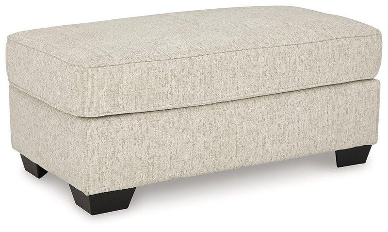 Ashley Furniture Heartcort living room set with plush sofas and coordinating coffee table, modern design in neutral tones.