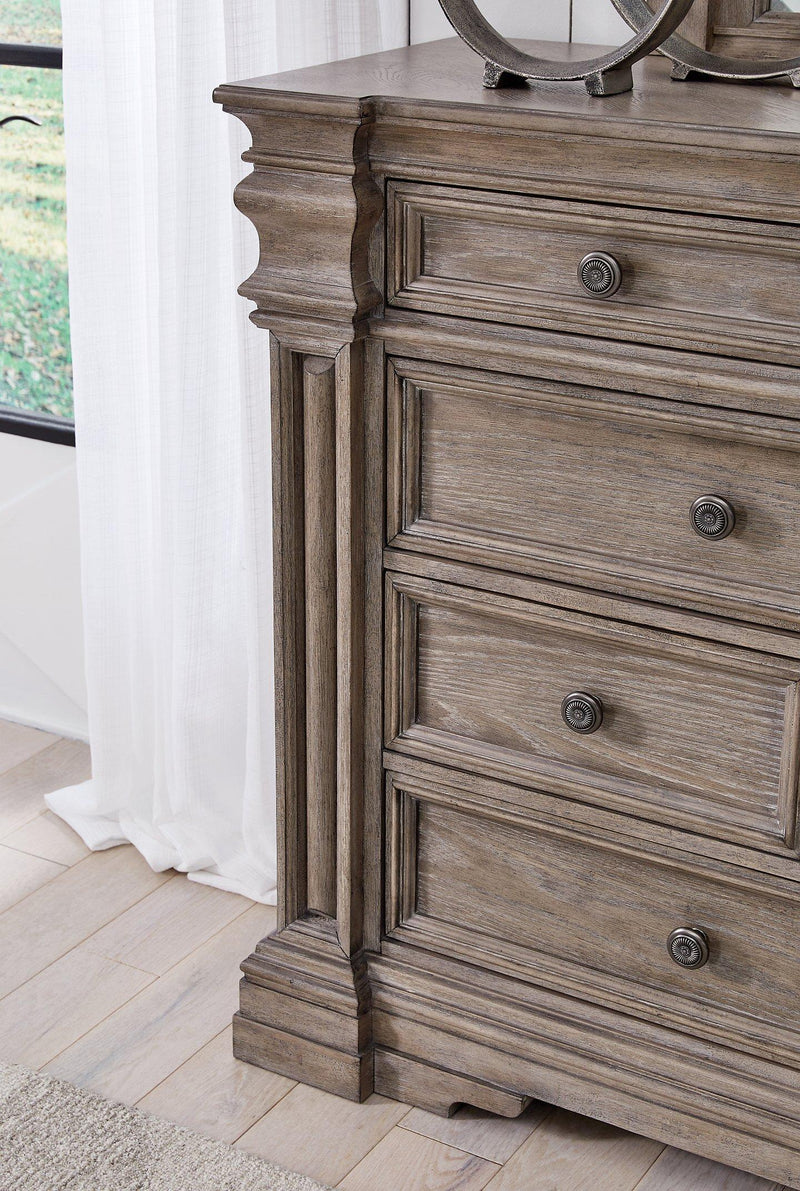 Ashley Furniture Blairhurst dresser with multiple drawers and sleek wood finish, ideal for bedroom storage.