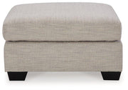 Ashley Furniture Mahoney living room set with sofa and armchair in a modern, stylish living space.