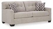 Ashley Furniture Mahoney living room set featuring a sofa, armchair, and coffee table in a modern living room setting.