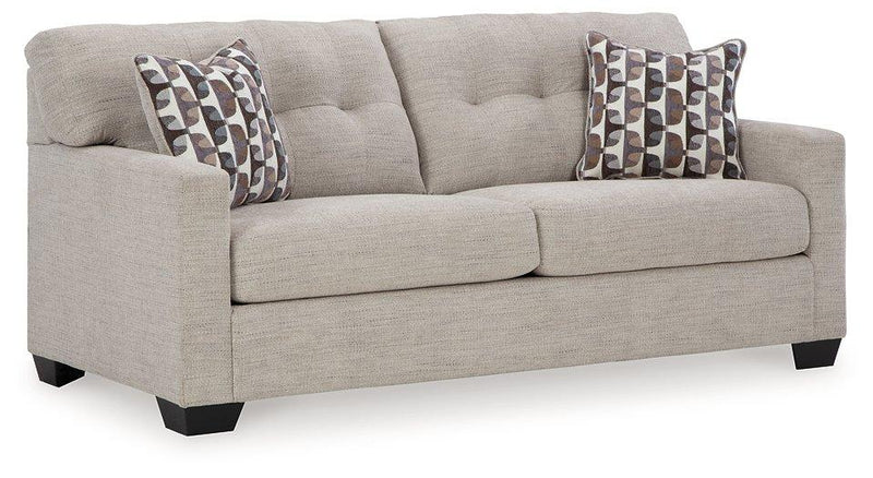 Ashley Furniture Mahoney living room set featuring a sofa, armchair, and coffee table in a modern living room setting.
