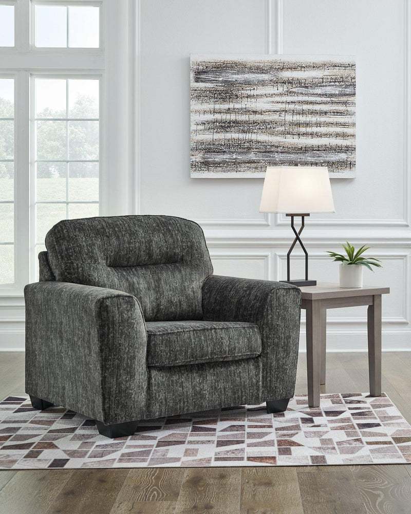 Ashley Furniture Lonoke living room set with sofa and loveseat featuring neutral upholstery and modern design.