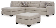 Ashley Mahoney living room set featuring a sofa and armchair with neutral upholstery and modern design.