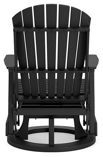 Ashley Furniture Hyland Wave outdoor swivel glider chair with cushioned seat and back for comfortable outdoor dining and relaxation.