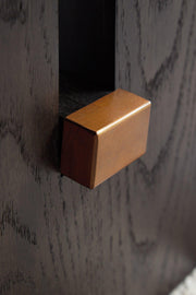 Ashley Furniture Burkhaus Occasional Table Set featuring two modern wood tables with sleek metal legs on a neutral background