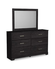 Ashley Furniture Belachime bedroom set featuring a modern bed frame, matching nightstands, and a stylish dresser in a cozy bedroom scene.
