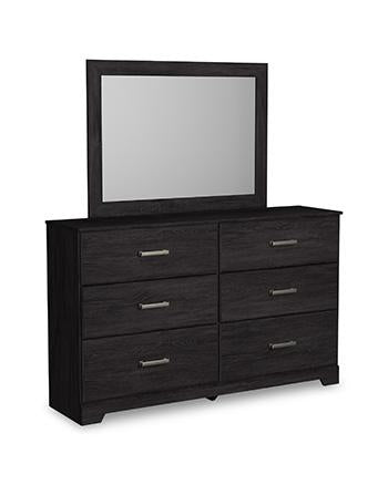 Ashley Furniture Belachime bedroom set featuring a modern bed frame, matching nightstands, and a stylish dresser in a cozy bedroom scene.