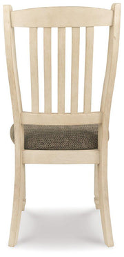 Ashley Furniture Bolanburg dining chair with cushioned seat and wooden legs, showcasing a modern design.