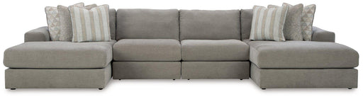 Ashley Furniture Avaliyah double chaise sectional with plush fabric and modern design, shown in a spacious living room setting.