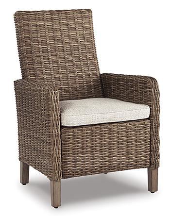 Set of two Ashley Furniture Beachcroft outdoor arm chairs with cushions, ideal for patio or garden seating.