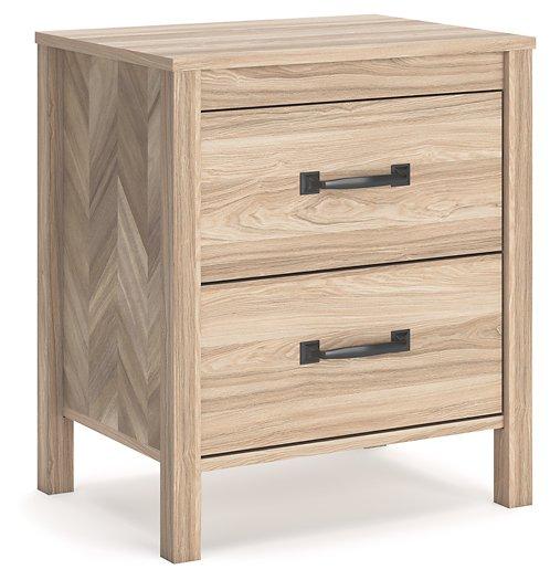 Ashley Furniture Battelle nightstand with a modern design, featuring a sleek wood finish and a single drawer for bedroom storage.