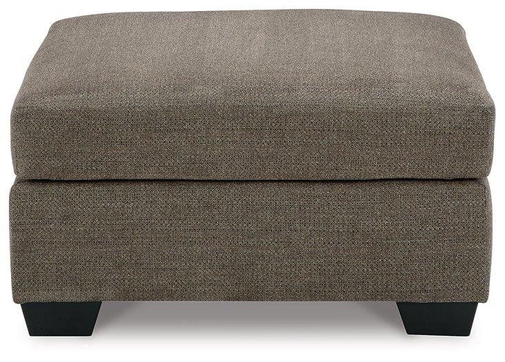 Ashley Furniture Mahoney living room set with sofa, loveseat, and coffee table arranged in a modern, comfortable living space.