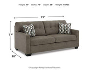 Ashley Furniture Mahoney living room set featuring a plush sofa and matching armchair, stylishly arranged in a modern living space.