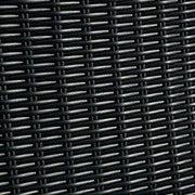 Set of two Ashley Furniture Beachcroft outdoor arm chairs with cushions, featuring weather-resistant wicker and comfortable seating.