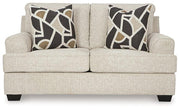 Ashley Furniture Heartcort living room set with plush sofa and armchair, modern design in a cozy living space.