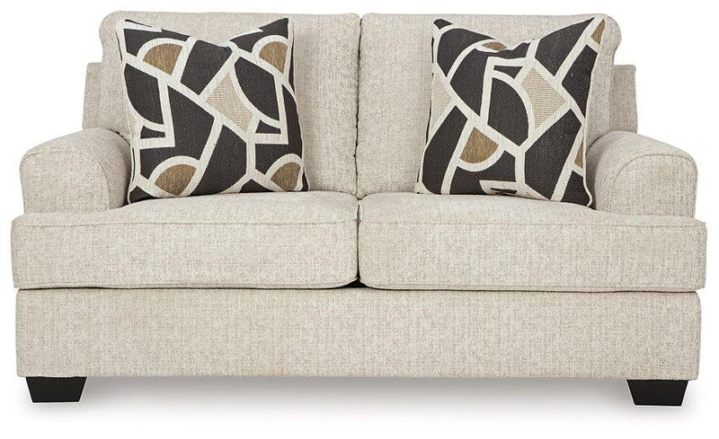 Ashley Furniture Heartcort living room set with plush sofa and armchair, modern design in a cozy living space.