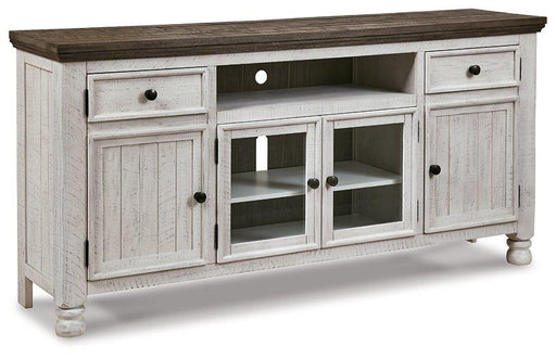 Ashley Furniture Havalance TV Stand showing a modern wood design with open shelving and storage compartments.