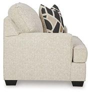 Ashley Furniture Heartcort living room set featuring a sofa, loveseat, and armchair in a modern design with neutral upholstery.