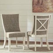 Ashley Furniture Bolanburg dining chair with upholstered seat and wooden legs, showcasing a modern, comfortable design.