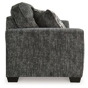 Ashley Furniture Lonoke living room set with sofa and armchairs in a modern design, showcasing plush upholstery and stylish accents.