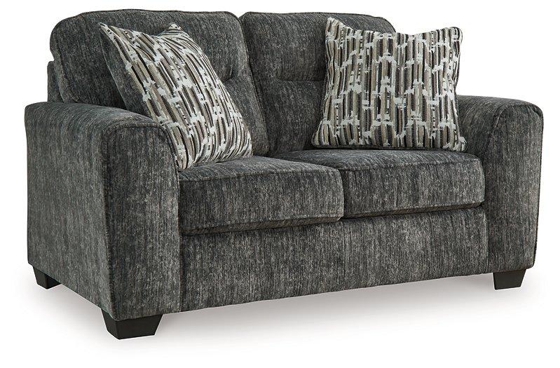 Ashley Furniture Lonoke living room set featuring a sofa and loveseat with neutral upholstery and modern design.
