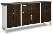 Ashley Furniture Havalance TV Stand with open shelves and storage compartments for entertainment devices and accessories.