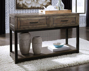 Ashley Furniture Johurst sofa console table featuring a sleek wooden surface and modern design, perfect for living room decor.
