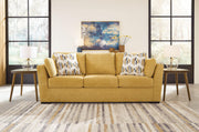 Ashley Furniture Keerwick living room set with sofa and armchairs in a modern design, styled in a contemporary living room setting