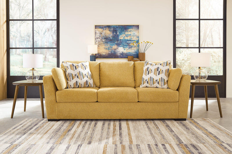 Ashley Furniture Keerwick living room set with sofa and armchairs in a modern design, styled in a contemporary living room setting