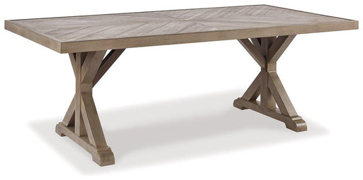 Outdoor dining table by Ashley Furniture, Beachcroft model, showing a spacious wooden table with a natural finish and sturdy legs.