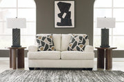 Ashley Furniture Heartcort living room set featuring a sofa and loveseat with plush upholstery and modern design for comfortable living space.
