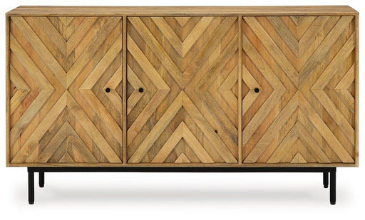 Ashley Furniture Cadewick accent cabinet with wood finish and storage drawers, showcasing its elegant design and craftsmanship.