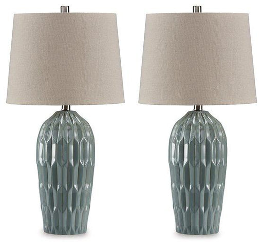 Pair of Hadbury table lamps by Ashley Furniture, featuring modern ceramic bases and fabric shades on a wooden surface.