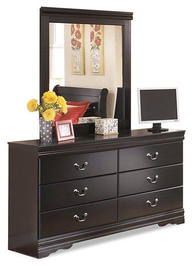 Ashley Furniture Huey Vineyard dresser and mirror set, featuring a wooden dresser with six drawers and a matching rectangular mirror.