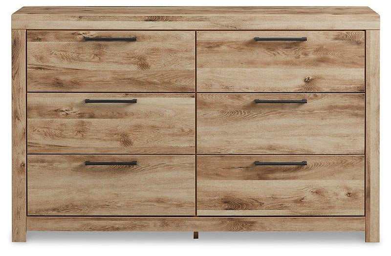 Ashley Hyanna Dresser with multiple drawers and dark wood finish, showcasing modern bedroom furniture design.