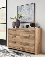 Modern Ashley Furniture Hyanna Dresser with sleek wood finish and six spacious drawers, ideal for bedroom storage.