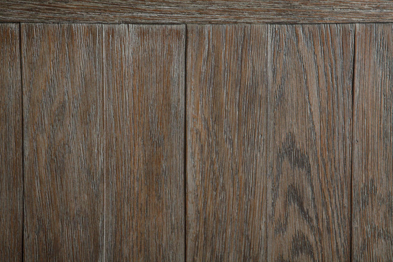 Ashley Furniture Tyler Creek Occasional Table Set with three matching wood tables featuring modern design and warm finish.