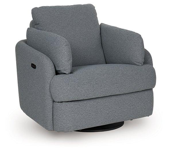 Ashley Furniture Alainmont Next-Gen Nuvella swivel power recliner accent chair with plush upholstery and modern design.