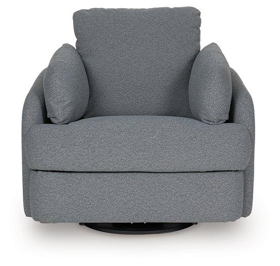 Ashley Furniture Alainmont Next-Gen Nuvella swivel power recliner accent chair with plush cushioning and modern design.