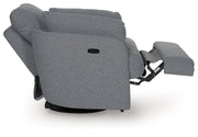 Ashley Furniture Alainmont Next-Gen Nuvella swivel power recliner accent chair with plush upholstery and modern design.