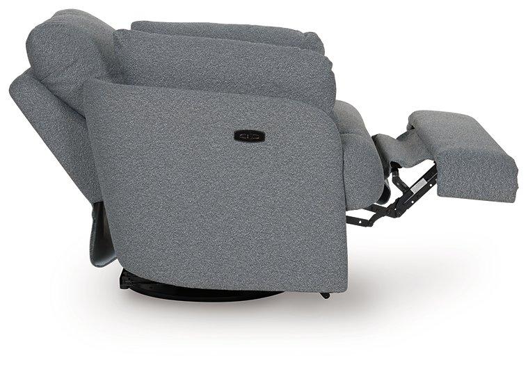 Ashley Furniture Alainmont Next-Gen Nuvella swivel power recliner accent chair with plush upholstery and modern design.