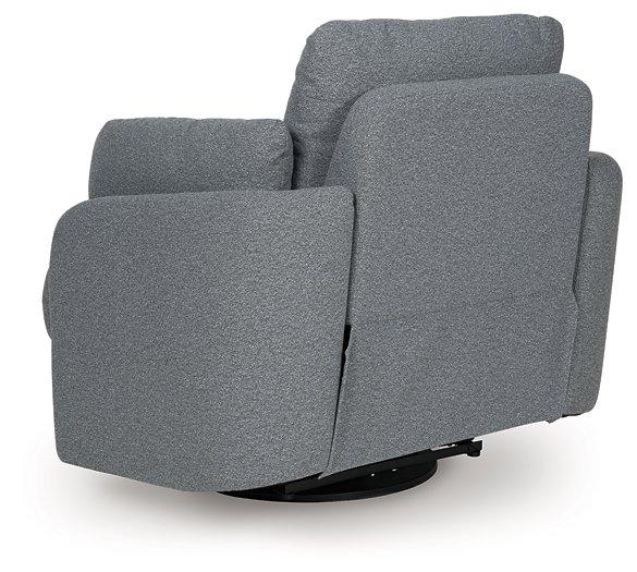 Ashley Furniture Alainmont Next-Gen Nuvella swivel power recliner accent chair with plush upholstery and modern design.