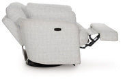 Ashley Furniture Alainmont Next-Gen Nuvella swivel power recliner accent chair with plush upholstery and modern design.