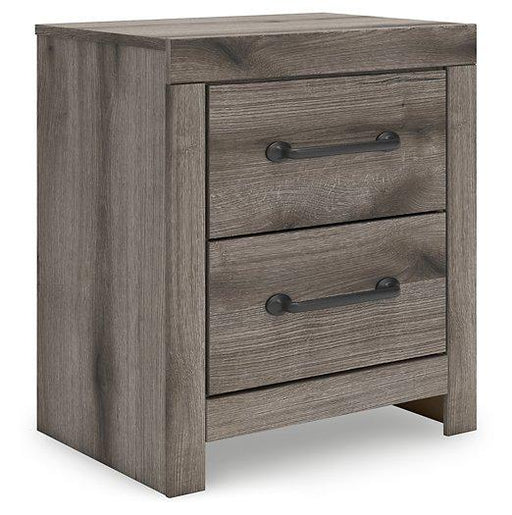 Graystorm nightstand by Ashley Furniture with a sleek design, featuring a single drawer and open shelf for bedroom storage.