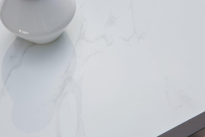 Ashley Furniture Beachloft outdoor cocktail table with a modern design, featuring a sturdy wooden top and metal frame.