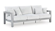 Outdoor table set by Ashley Furniture featuring a durable table and matching chairs from the Hurley Park Outdoor Package.